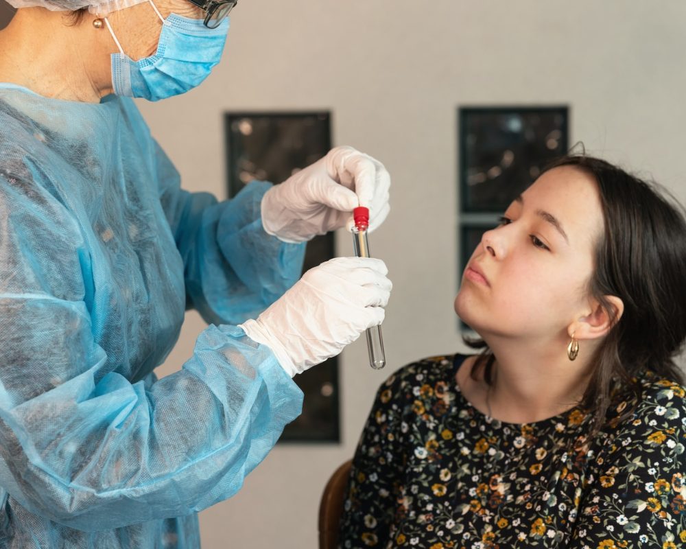 doctor-takes-a-swab-from-the-girl-s-nose-dna-test-2023-11-27-04-50-41-utc